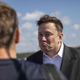 Elon Musk frowns deeply.